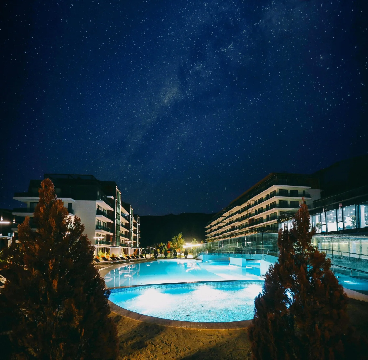 The complex lit up at night